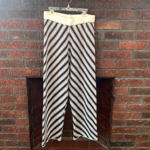 Flare sweater pants with white, gray, and navy blue diagonal stripes. Size M